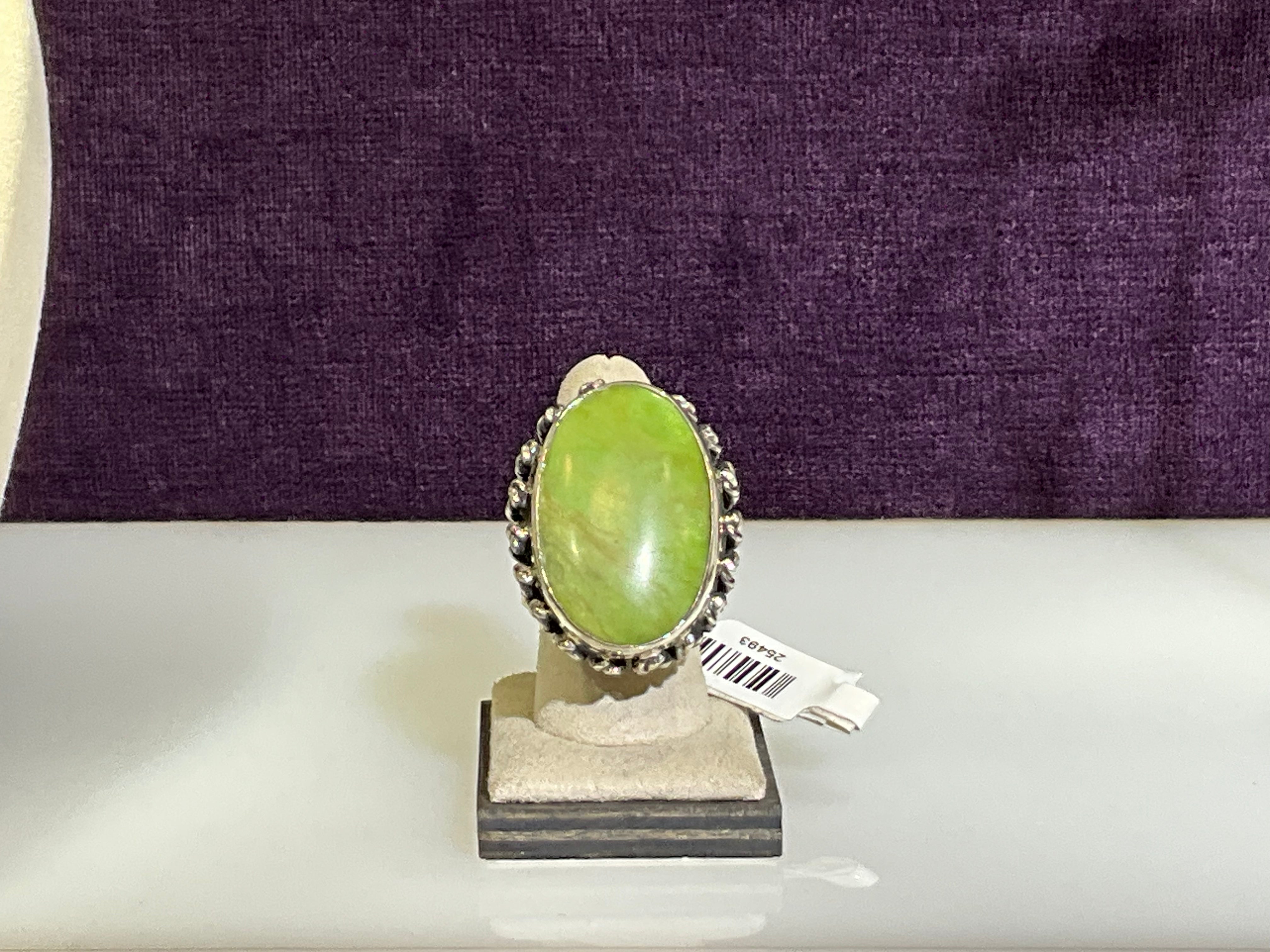 SS green oval ring